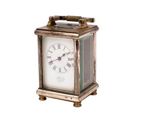 An Edwardian French carriage clock having an eight-day duration timepiece movement with a cylinder platform escapement and ha