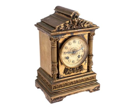 A French Victorian brass mantel clock the eight-day duration movement having a platform lever escapement and striking the hou