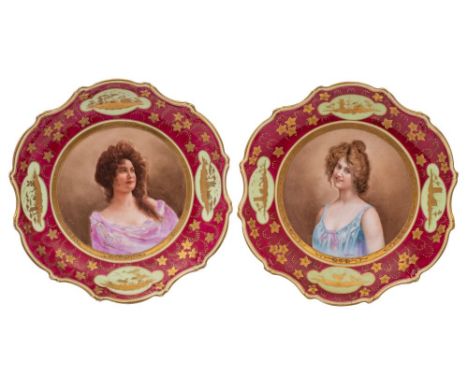 A pair of Austrian porcelain shallow dishes, of shaped circular form each decorated with a female half portrait, signed E. Ve