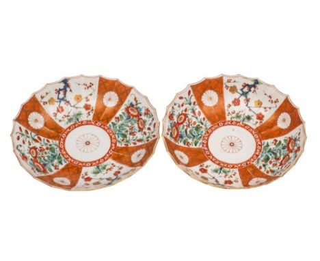 A pair of First Period Worcester fluted saucer dishes painted in the 'Scarlet Japan' pattern with alternating fan-shaped pane