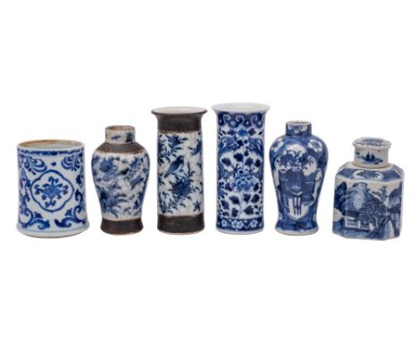 A group of five small Chinese blue and white vases together with a caddy and cover, Qing Dynasty including a jar painted with