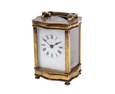 A French carriage clock the eight-day duration timepiece movement having a later platform lever escapement, the white enamel 