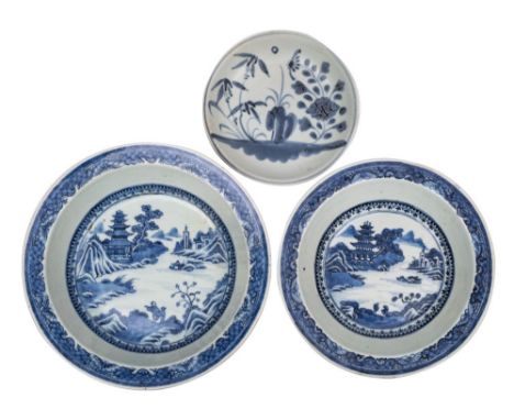 Two Chinese blue and white deep dishes and a 'Tek Sing Cargo' saucer dish: the first two painted with a pagoda lake landscape