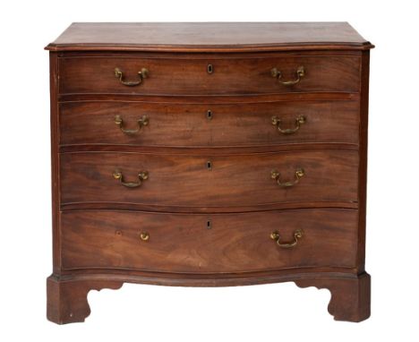 A George III mahogany serpentine front chest of drawers, circa 1775; the top with ogee moulded edges, above four graduated lo