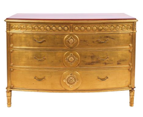 A giltwood bowfront commode in George II taste, 20th century; the top with reeded edges; above two short drawers with recesse