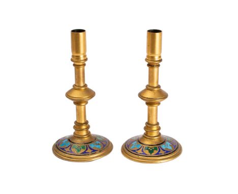 A pair of gilt brass and champleve enamel candlesticks, late 19th century, French or possibly Russian, the knopped stems abov