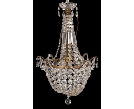 A gilt metal and cut glass chandelier in Regency style, 20th century; the electrical fitment within a circlet with cut glass 