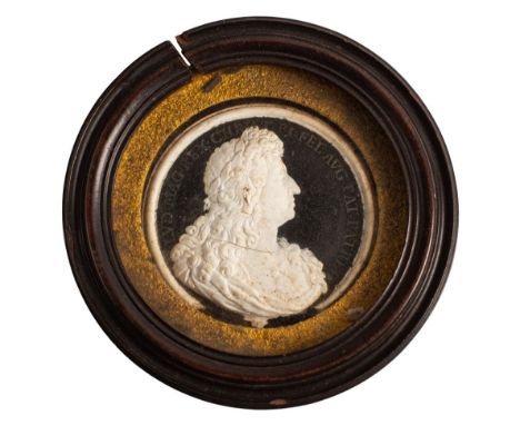 A plaster portrait medallion of King Louis XIV of France (1638-1715), the sitter portrayed in profile, looking to dexter, 7cm