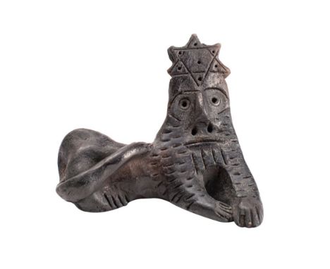A pottery model depicting The Lion of Judah in recumbent pose, crowned with the Star of David,  with incised and pierced deco