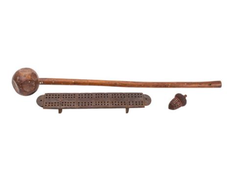 A Knobkerrie  with circular pommel with chamfered sides, mounted on a slender tapering shaft, 62cm long, nutmeg grater holder