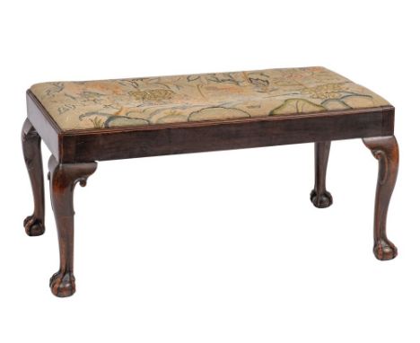 A carved walnut and tapestry upholstered long stool in George II taste, 46cm high, 95cm long; two George III mahogany side ch