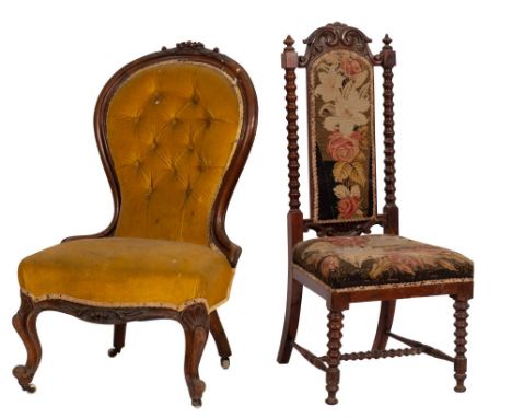 A Victorian carved walnut and button upholstered slipper back nursing chair, circa 1860; the show frame of the arched backres