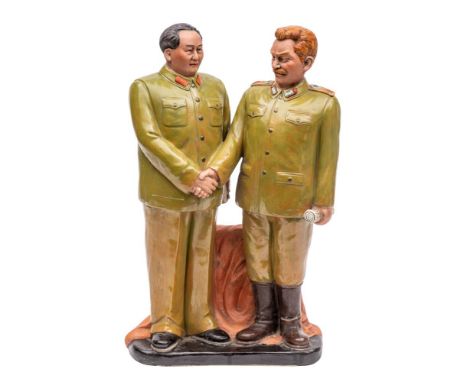 A Chinese glazed earthenware 'Cultural Revolution' group depicting Chairman Mao and Joseph Stalin shaking hands, seal mark, 2