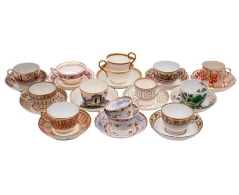 A collection of late 18th/early 19th century English porcelain trios, teacups and coffee cans and saucers including a Newhall