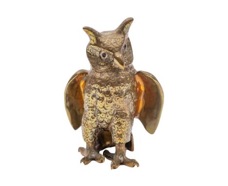A Sri Lankan brass and glass-inset model of a long-eared owl, 20th century, modelled standing, the underside numbered and sta
