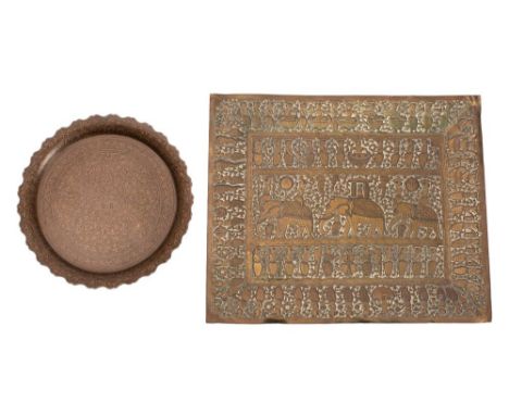 A Burmese rectangular repousse brass tray and a similar engraved circular tray the first decorated with a processional scene 