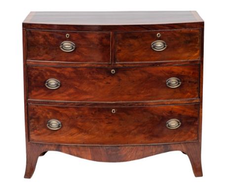 A late George III mahogany and crossbanded bowfront chest of drawers, early 19th century; the two short and two long drawers 