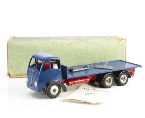 A Shackleton Toys Mechanical Foden FG6 Platform Lorry, dark blue cab and platform, black wings, red chassis and fuel tanks, s