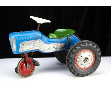 A Tri-ang TM2015 Farmer's Boy Pedal Tractor, as shown in the 1964 Tri-ang catalogue, blue plastic body, silver detail, black 