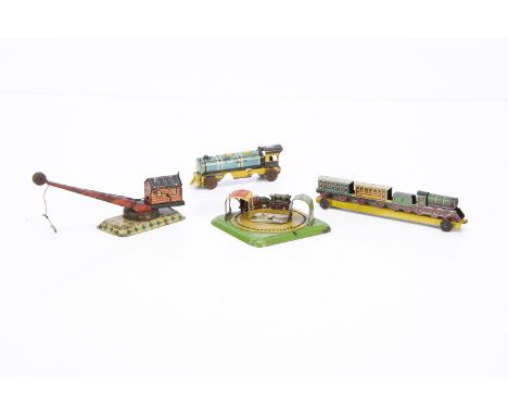 Small tinplate Train Toys by various makers, including small integral train of 2-6-0 locomotive, tender and two coaches by Pa