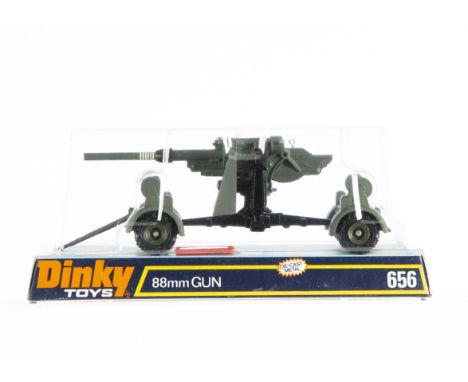 A Dinky Toys 656 88mm Gun, German grey, in original bubble pack with twelve unused and taped red plastic shells, E, packaging