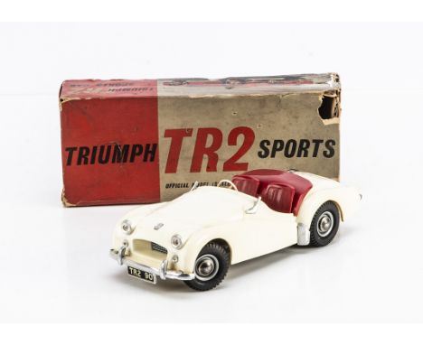 A Victory Models 1:18 Battery Operated Triumph TR2 Sports Car, ivory body, red seats and tonneau cover, 'TR2 90' reg, in orig