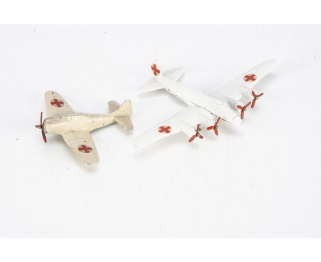 Tekno Nr.401 Flyvende Fastning (B17 Flying Fortress), white body, four red three blade props, red cross decals, with Nr.403 D
