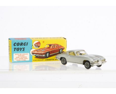 A Corgi Toys 310 Chevrolet Corvette Stingray, metallic silver body, lemon interior, wire wheels, in original box with club le