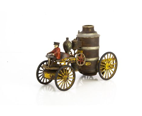 Early American Tinplate &amp; Cast Iron Clockwork Steam Fire Engine, with cast iron driver and wheels, yellow metal chassis, 