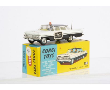 A Corgi Toys 481 Chevrolet Impala Police Car, white/black body, lemon interior, 'Police Patrol' door labels, spun hubs, in or