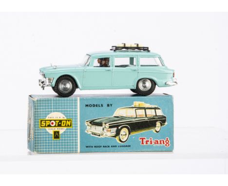 A Tri-ang Spot-On No.183 Humber Super Snipe Estate Car, light turquoise body, white interior, black roof rack, two pieces of 