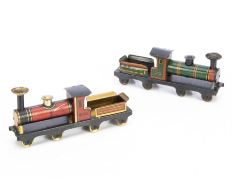 Two Hess 575-series (German) Floor Toy Locomotives, engine and tender both on integral 4-axles bases, one in red with black a