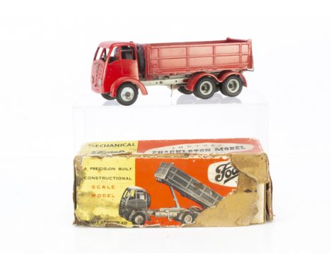 A Shackleton Toys Mechanical Foden FG6 Tipper Lorry, red cab, wings, tipper and fuel tank, grey chassis and wheels, clockwork