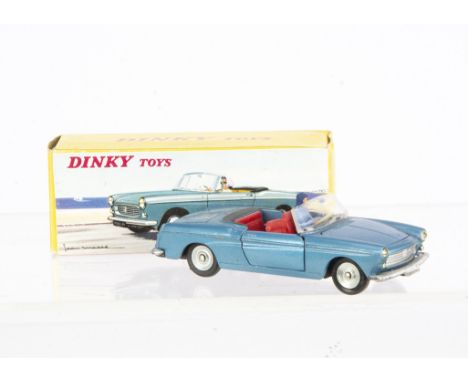 A French Dinky Toys 528 Peugeot 404 Pininfarina Cabriolet, metallic blue body, red interior, female driver, concave hubs, in 