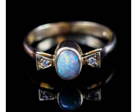 Opal. diamond and 14ct rose gold ring marked 585. Approx weight 2.24 grams, ring size L-M