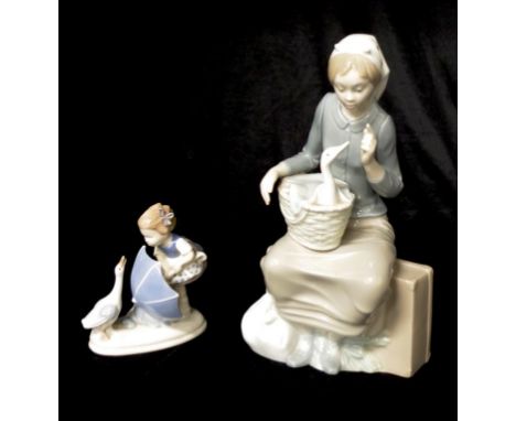 Nao figure of girl and goose seated on a suitcase (named Off to the City) 28cm high, together with a small German figure of a