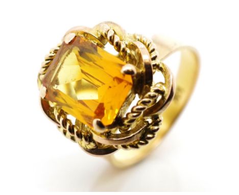 Citrine and yellow gold cocktail ring marked 14k. Approx weight 5.3 grams, ring size K
