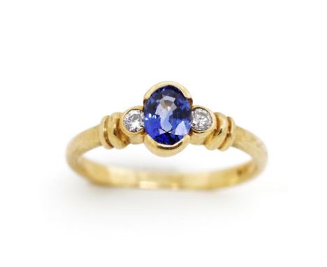 Sapphire and diamond set 9ct yellow gold ring marked 9ct. Approx weight 1.7 grams, ring size J-K