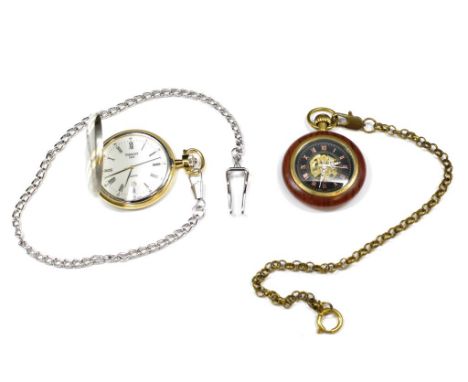 A Tissot fob watch and a skeletonised fob watch the tissot quartz one needs a battery, the skeletonised version was wokring w