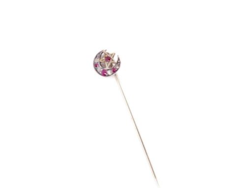 Victorian diamond and ruby set stick pin on a gold and silver crescent moon and star settings mounted on a base metal pin