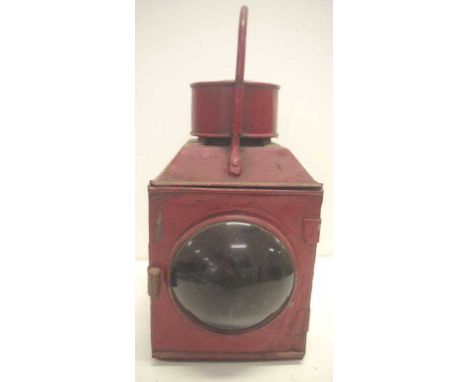 Antique railway wagon oil lamp with red lens to one side and a clear lens to the opposite side,  37cm high approx