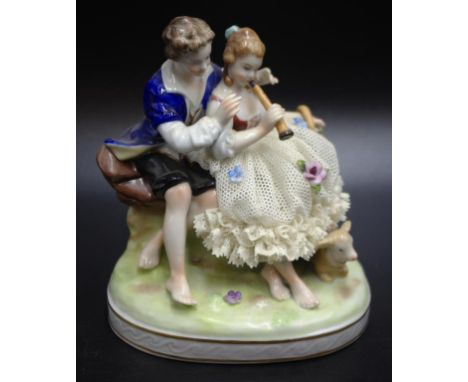 Dresden Musical Couple figure seated couple, Woman with recorder, marked to base, (height 13cm approx).