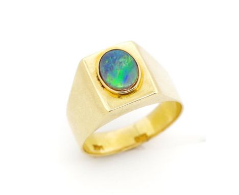 Opal set 14ct yellow gold ring marked 585. Approx weight 7.29 grams, ring size T