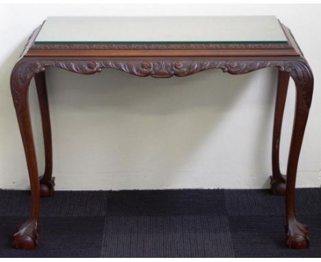 Chippendale style hall table with clawed ball feet and ornate carving. 110cm long, by 64cm wide and 80cm tall.