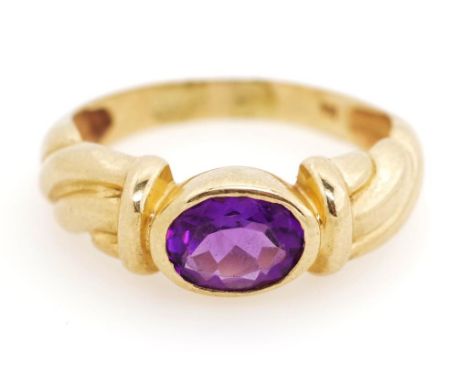 Amethyst and 9ct yellow gold ring marked 9k. Approx weight 3.8 grams, ring size R
