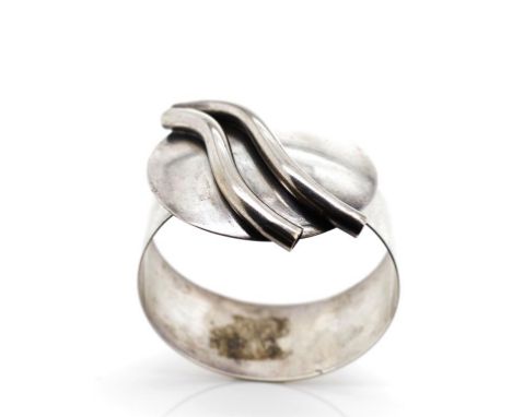 Modernist silver bangle unmarked with a hook clasp. Approx weight 36 grams, width 54mm