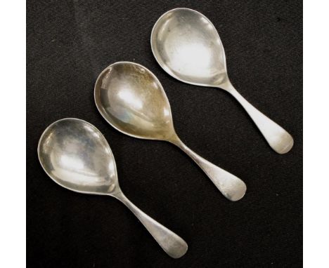 Set  three George V sterling silver caddy spoons Sheffield 1912, makers Walker and Hall, (weight 48grams approx, total).