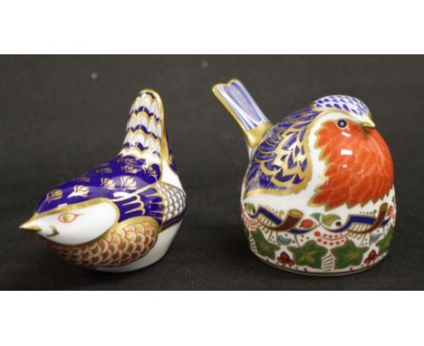 Two Royal Crown Derby Robin paperweights including 'Robin Nesting,' with silver button to base, (height 7cm approx); and anot