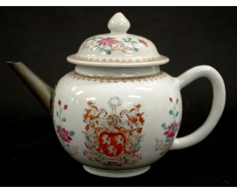 Qianlong 18th C Chinese export teapot with silver spout, and family crest to both sides, with floral sprays. Gilt highlights.