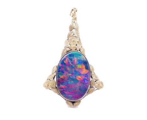 Australian Arts &amp; crafts 9ct rose gold pendant set with a large opal triplet. Marked 9ct. Approx weight 5.57 grams